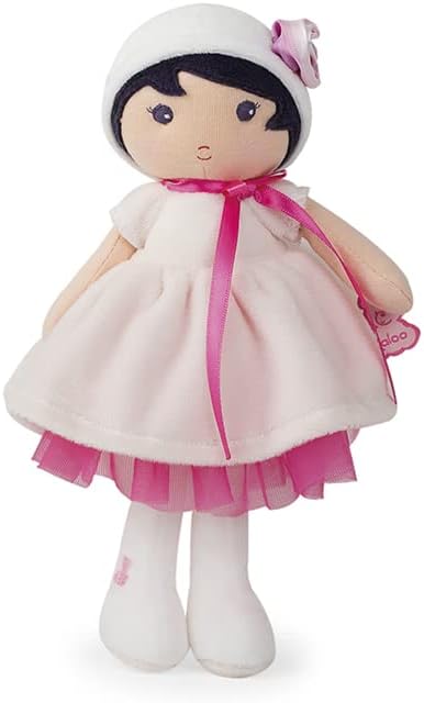 Soft plush doll with black hair, white flower hat, and a pink velvet dress with a bright pink ribbon and tulle trim.