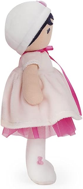 Plush doll in profile wearing a white hat and dress with a pink tulle skirt and a pink ribbon tie.