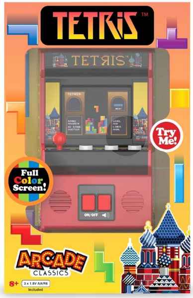 Red mini arcade machine with a color screen and joystick in orange packaging with Tetris blocks and cathedrals.