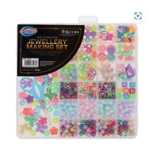 Clear plastic case with colorful beads in various shapes and letters, plus a pair of light blue safety scissors.