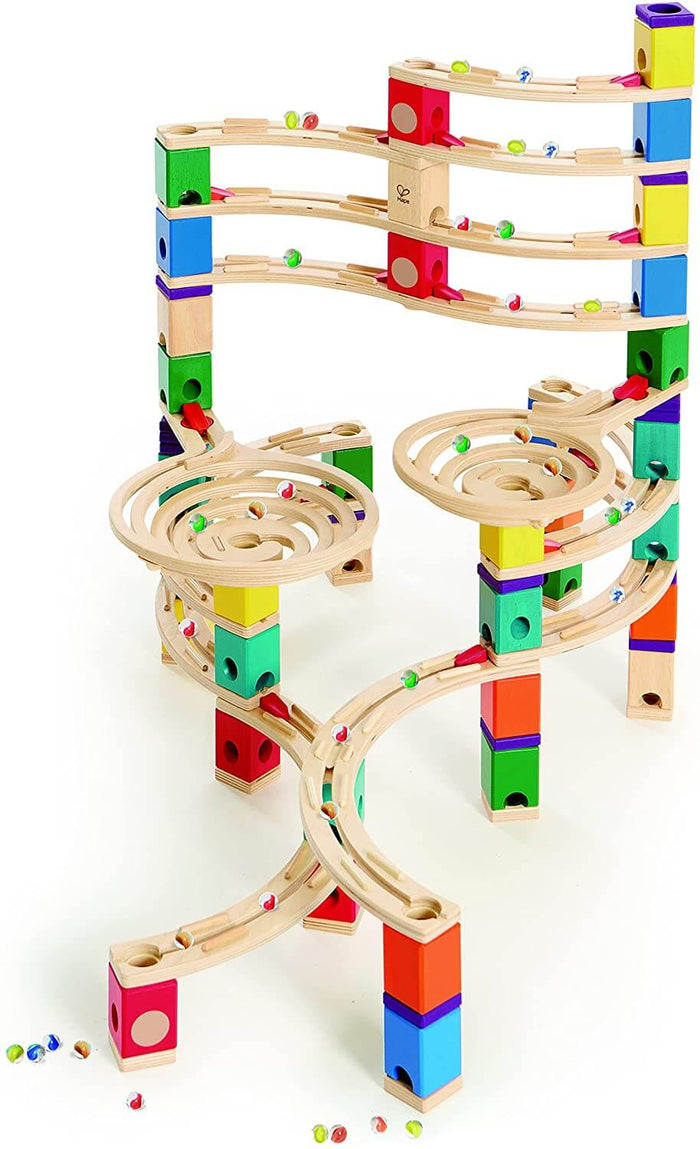 Colorful wooden marble run featuring multi-level tracks, two spiral funnels, vibrant blocks, and glass marbles.
