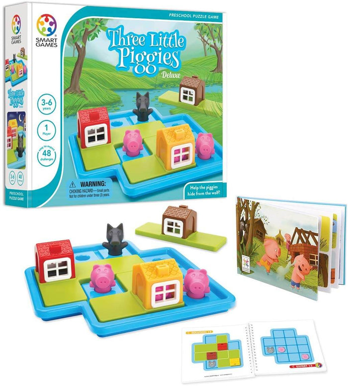 Preschool puzzle game with pink pig figures, a black wolf, colorful house pieces on a blue board, and booklets.