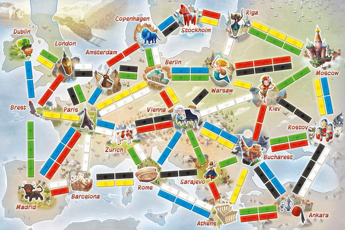 Colorful board game map of Europe with cartoon city icons and bright rectangular train paths connecting them.