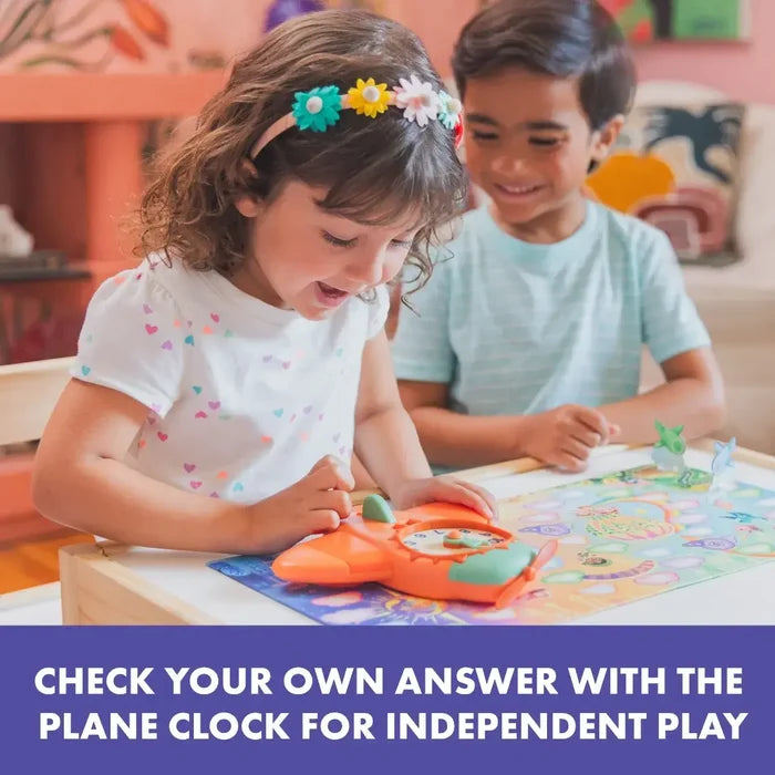 Two children play with an orange airplane clock toy featuring teal accents on a colorful board game.