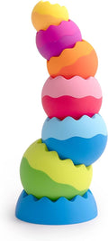 Six colorful, dual-toned spheres with wavy edges stacked in a balanced tower on a bright blue base.