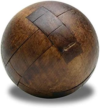 Spherical wooden brainteaser puzzle with interlocking dark brown pieces and visible wood grain texture.