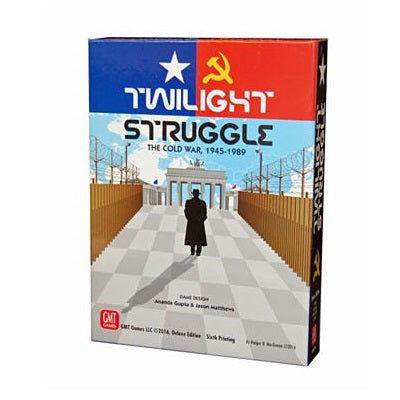 Board game box with blue and red top panels. A man in a coat walks a checkered path between walls toward a stone gate.
