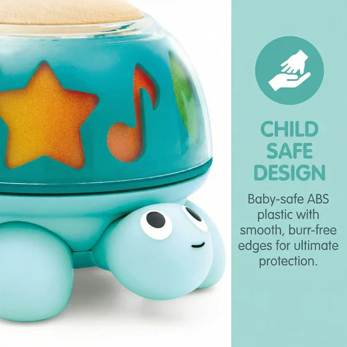 Blue turtle toy with a translucent shell featuring orange star and music note shapes and smooth, rounded edges.