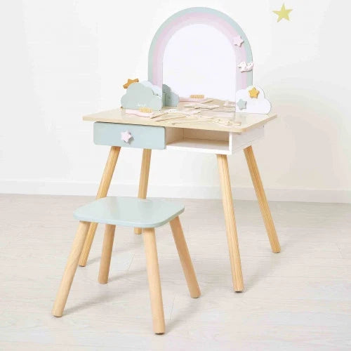 Wooden toy vanity with a rainbow-arched mirror, mint stool, and star details. Features four splayed natural wood legs.