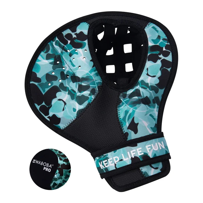 Teal and black camo water glove with a mesh pocket and adjustable strap next to a matching patterned Waboba Pro ball.