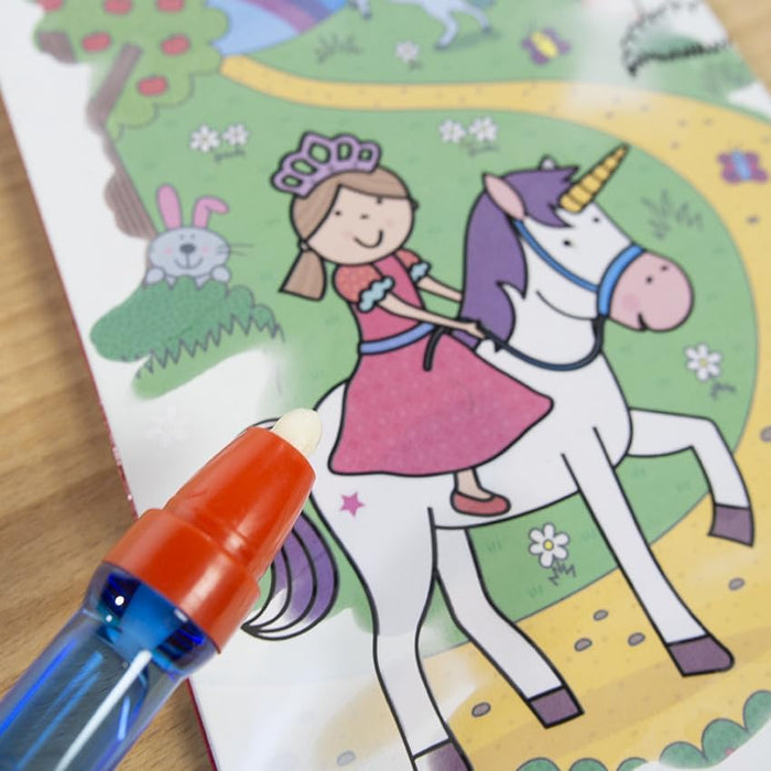 A blue and red water pen used on a colorful magic reveal page of a princess riding a unicorn.