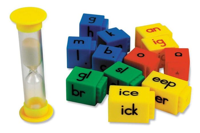 Colorful interlocking phonics cubes with letters and blends next to a yellow sand timer.