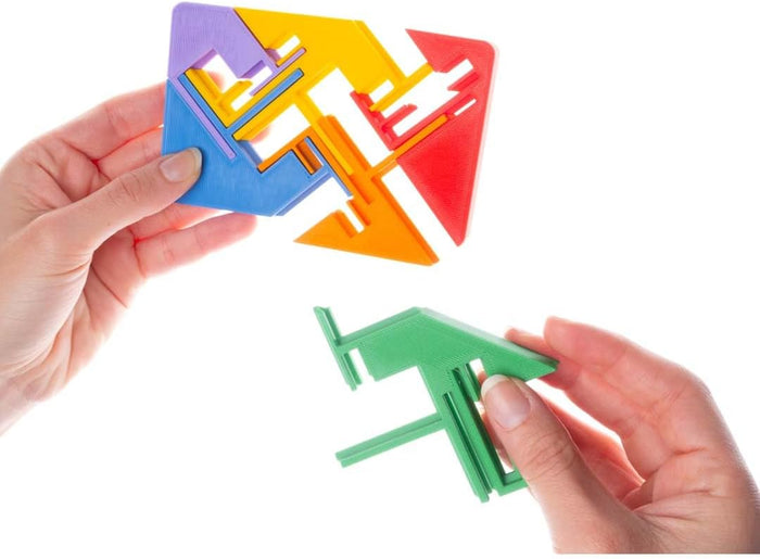 Hands holding a flat sliding puzzle with colorful interlocking pieces in red, blue, green, orange, and yellow.